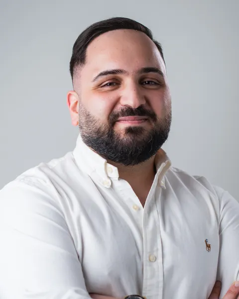 Porträtt av Morad Hasanoglu